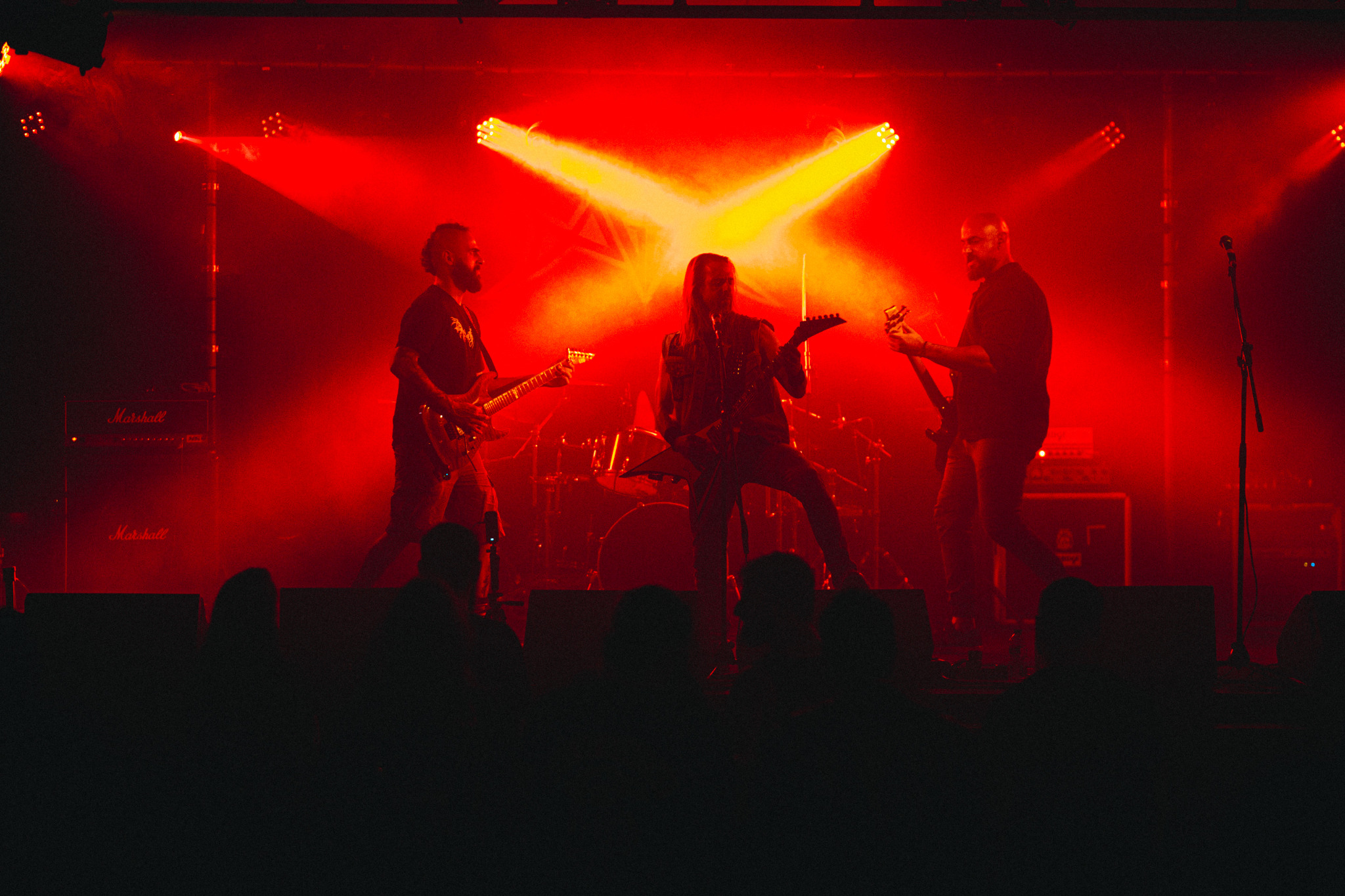 DAGGR live under red stage lights